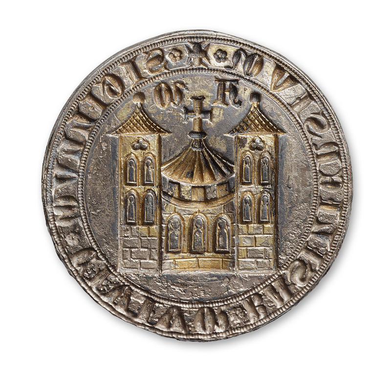 Ein Petschaft dient der Erstellung von Siegeln. Die Stempel für Gross- und Kleinbasel stammen aus dem 14. Jahrhundert. Der Grossbasler Stempel ist aus Silber gefertigt, und sein hoher Wert zeigt sich darin, dass er in der Stadtkasse aufbewahrt wird. Das Basler Siegelbild repräsentiert das Selbstverständnis der Stadt. Es zeigt die Chorfront des Münsters. Auf dem Dach thront ein Kreuz, das auf einem Globus steht. Links und rechts davon sind die griechischen Buchstaben Alpha und Omega eingetragen. Die Bildelemente verweisen auf den Bischof, die Umschrift lautet indessen SIGILLVM CIVIVMBASILIENSIVM (Siegel der Basler Bürger) und dokumentiert die Zusammenarbeit zwischen Bischof und Stadt.
